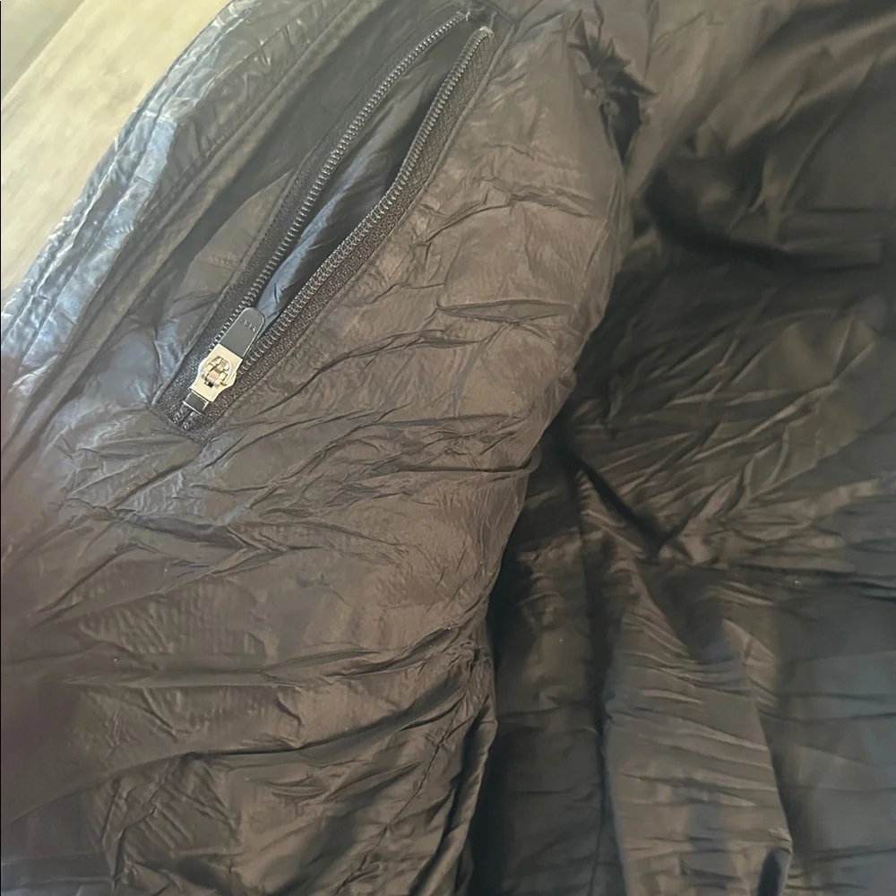 Moose Knuckles black hooded puffer with hologram imprint logo size small